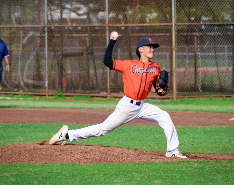 Logan Carvalho follows through his pitch with perfect form striking out the opponent. Photo by Logan Carvalho.