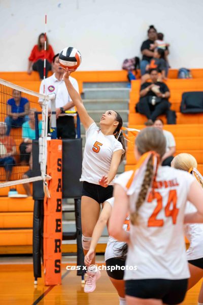 Sophomore Aleyah Tuitele, #5, on the Junior Varsity Volleyball Team helps her team rally against the Radford Rams.